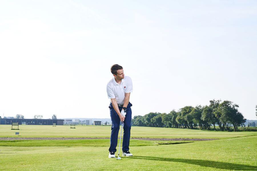 golfer getting ready for short game shot